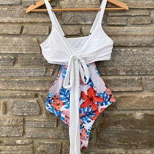 | NEW | Women's 1 Piece Bathing Suit With Sexy Cut Outs.